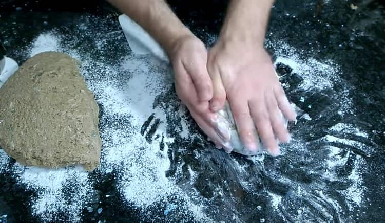 We form a loaf of bread from the dough.