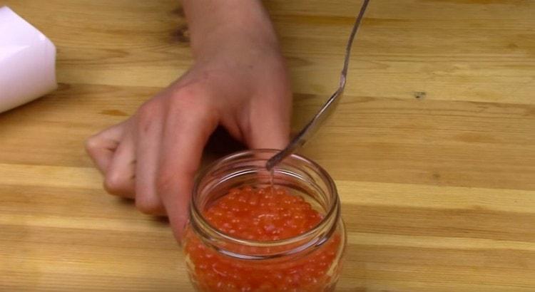 We shift the eggs into a jar and add a little vegetable oil.