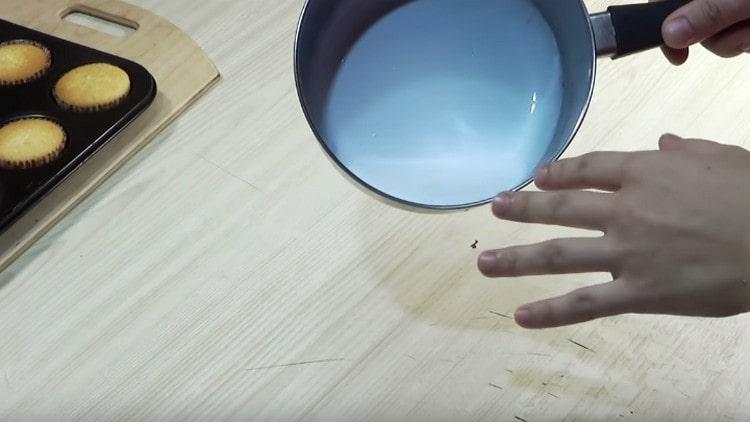 In a saucepan, heat the cream.