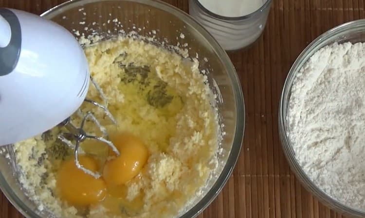 Add the eggs to the butter mass and beat again.