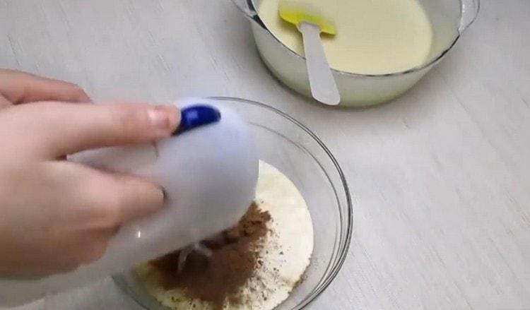 Dividing the dough in half, add cocoa in one part and mix.