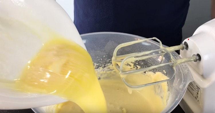 Add melted butter to the dough.