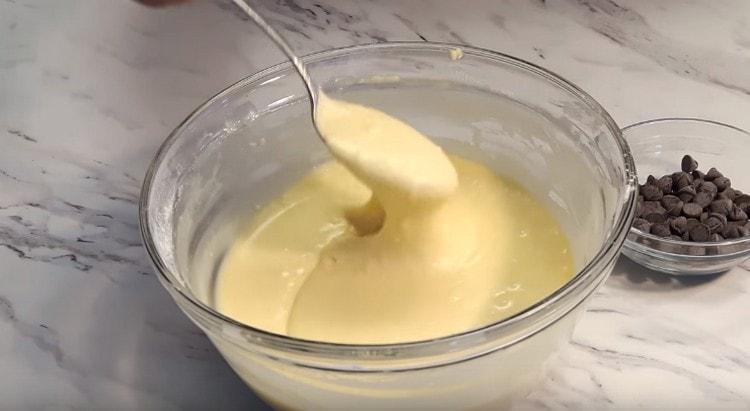 Mix the dough to a uniform thick consistency.