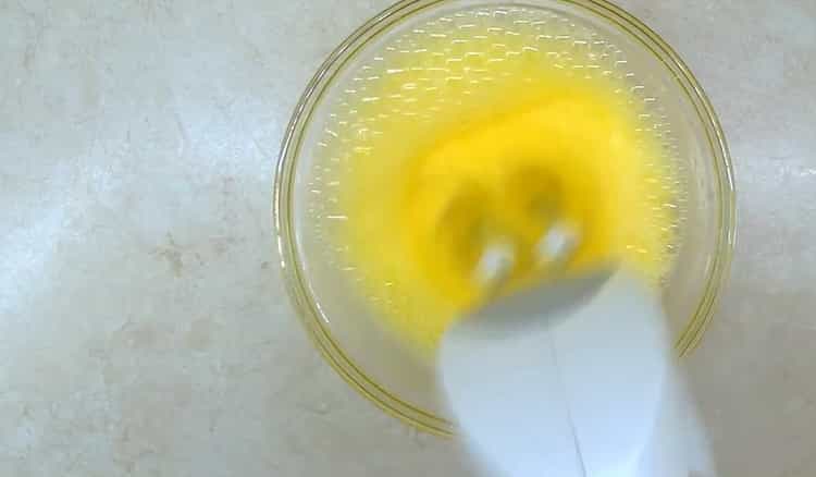 To make a classic Easter cake with a simple recipe, beat the eggs.