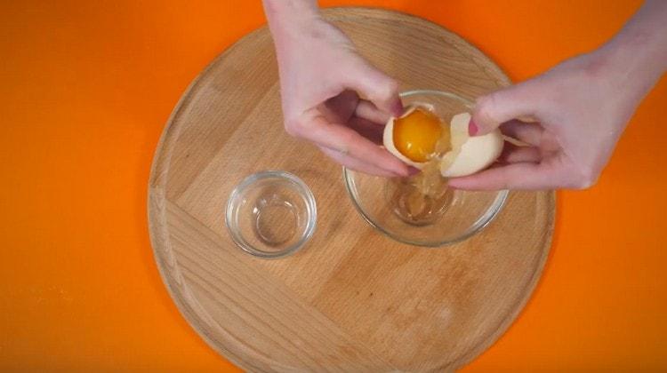 Separate the yolk from the protein.