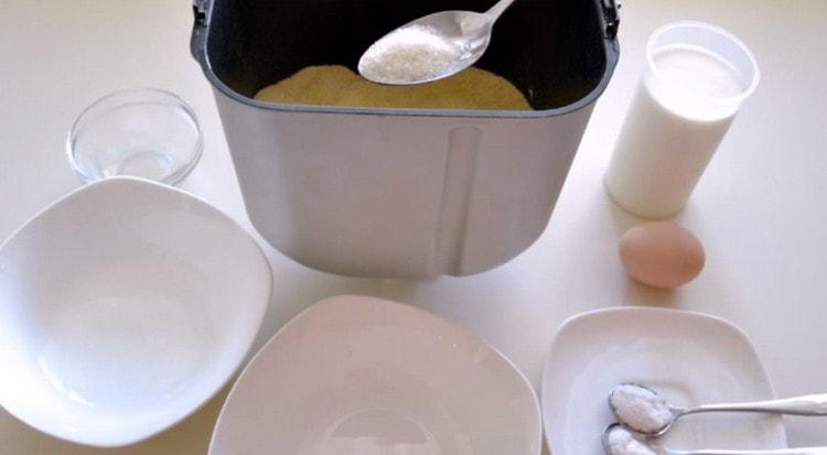 Add sugar, salt, baking powder.