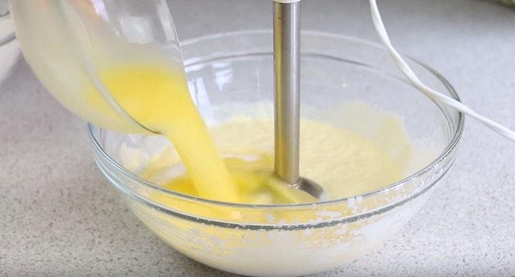 Add eggs to the curd, as well as melted butter.