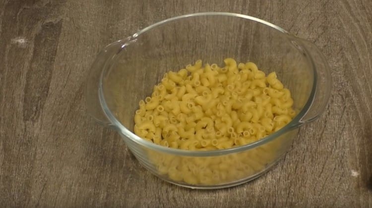 Pour pasta into a glass dish.