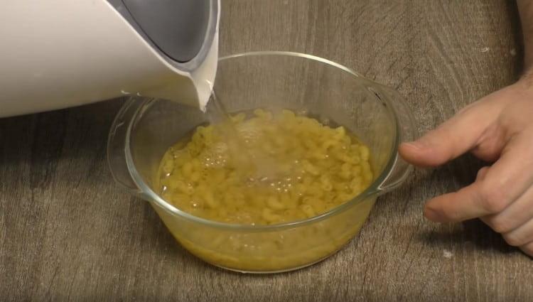 Pour pasta with boiling water.