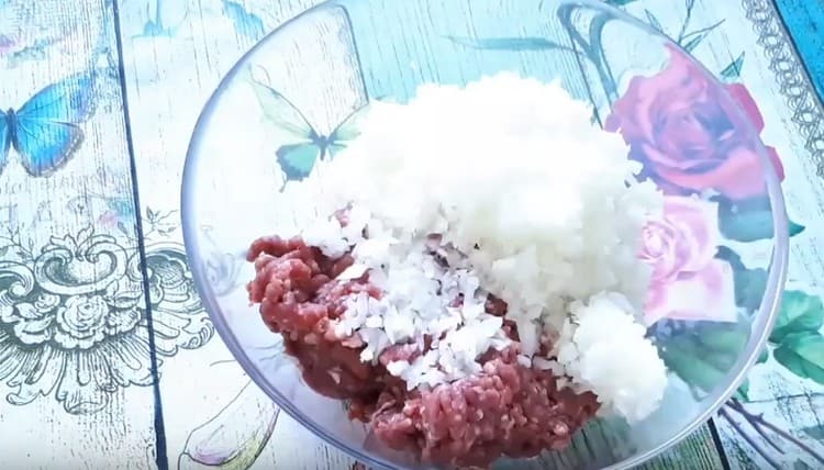 Stuffing is combined with chopped onions.