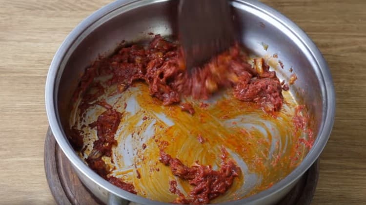 Now add the tomato paste.