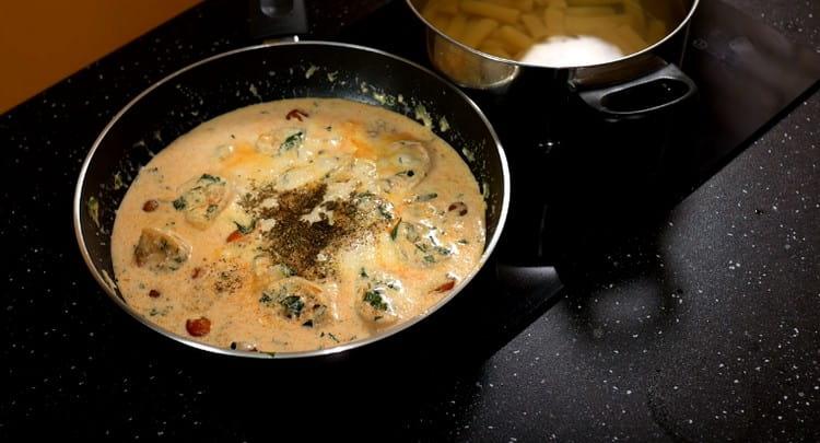 Add some mozzarella cheese, as well as spices.