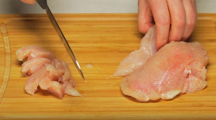 Chicken fillet cut into thin strips.