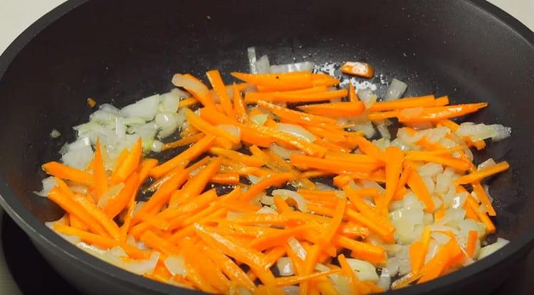 Add carrot to the onion.