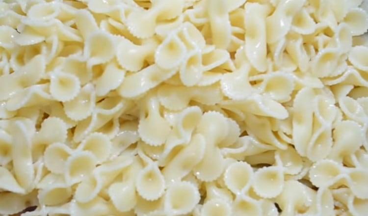 Boil pasta until cooked.