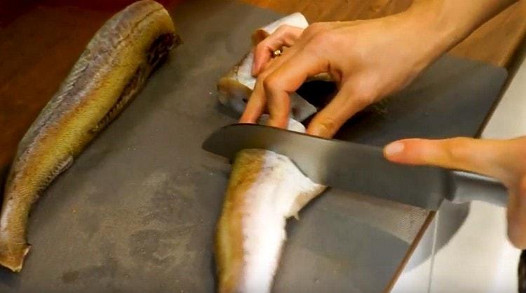 Cut the pollock into portion pieces.