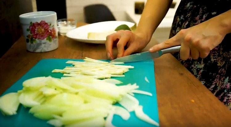 Cut the celery into strips.