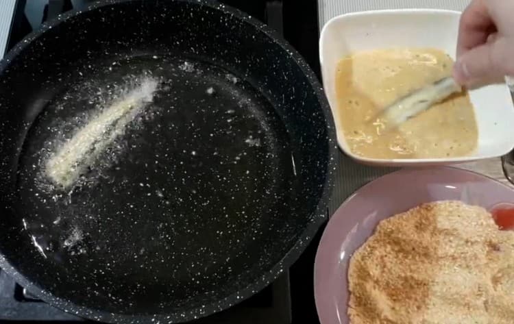 put the fish in the pan.