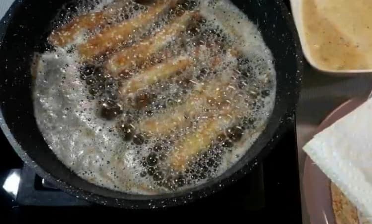 Fry capelin in batter until golden brown on both sides.