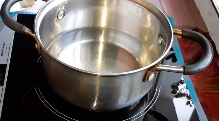 We put a pot of water on the fire.