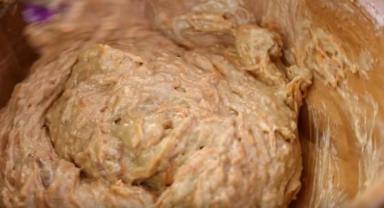 Add flour to the dough and mix.