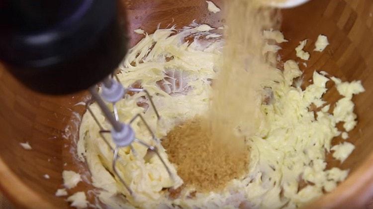 Beating butter, add sugar to it.