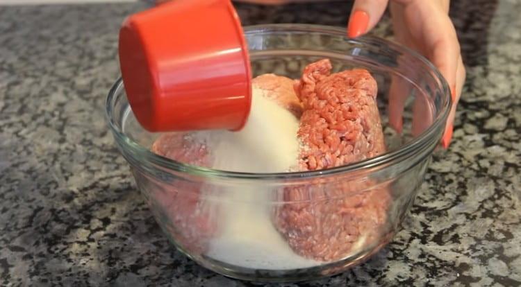 Minced meat is combined with breadcrumbs.