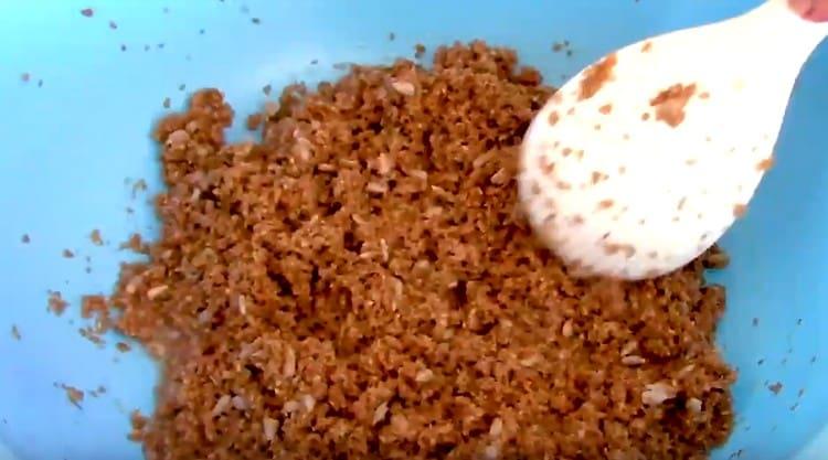 Add the seeds and mix the dough.