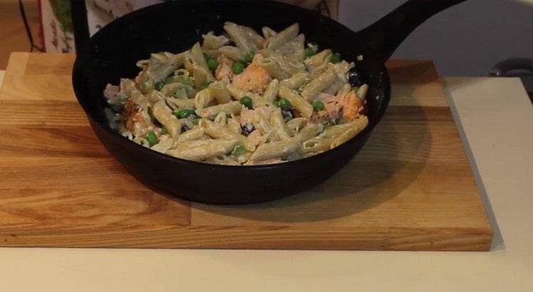 Salmon pasta in a creamy sauce is ready.
