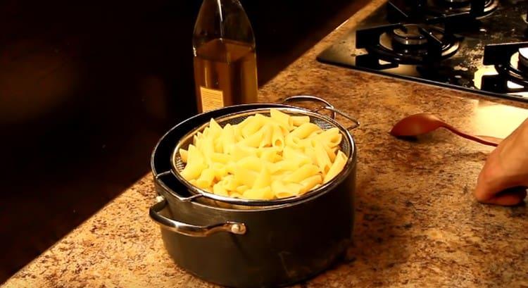 Boil the pasta until ready.