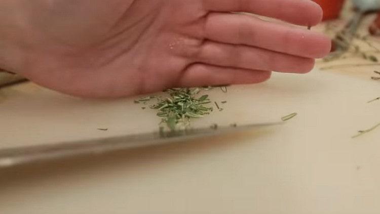 Grind rosemary leaves and add to the dish.