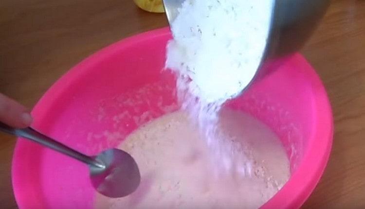 Pour the flour and knead the dough.