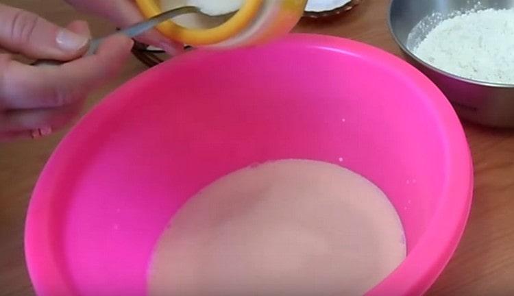 We add yeast and sugar to milk.