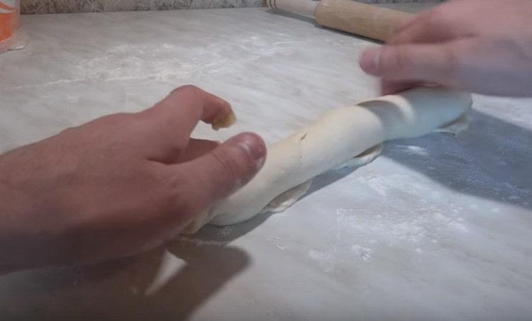 Twist the dough stuffed with a roll.