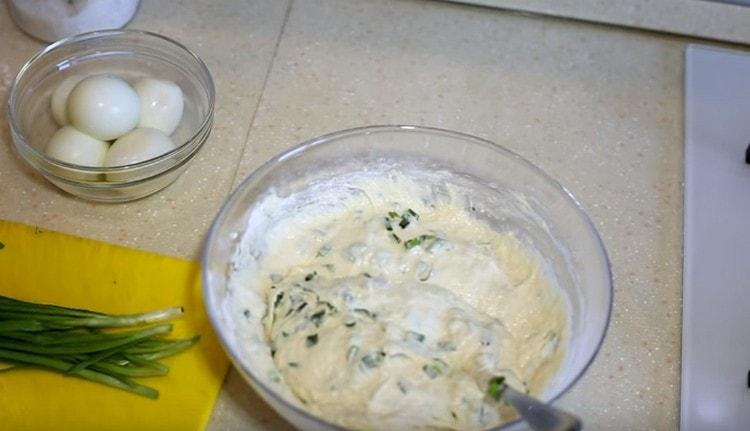 Add the onion to the dough and mix.