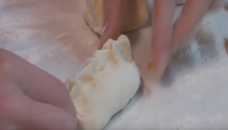 Pinch the edges of the pie.