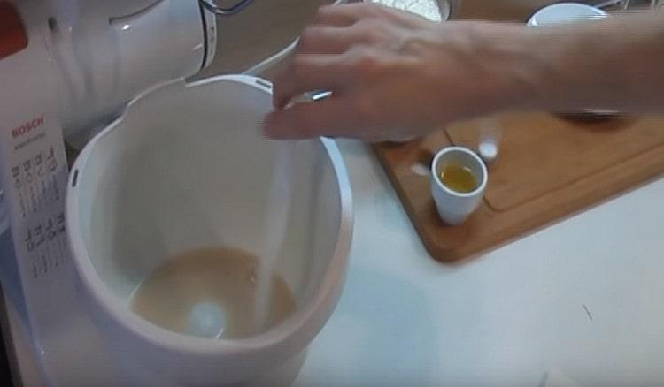 Add sugar and salt to the yeast mass.