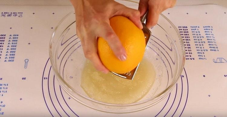 Rub the zest of orange to sugar with butter.