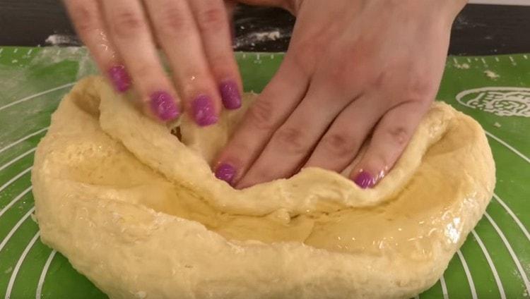 Stir the butter into the dough.