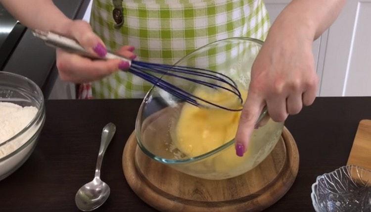 Add sugar, whisk again.