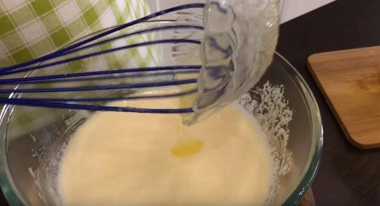 Introduce soda, salt, melted butter into the dough.