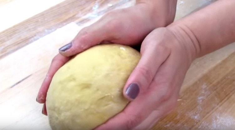 Knead the cool dough.