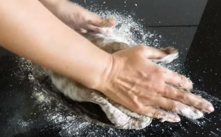 Knead the dough thoroughly on a floured surface.
