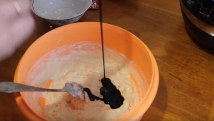 It's time to add liquid malt to the dough.