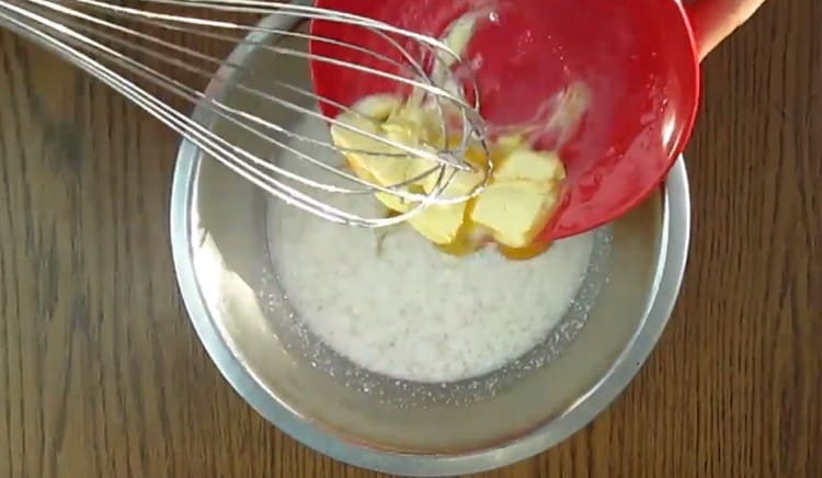 Add the egg and melted butter.