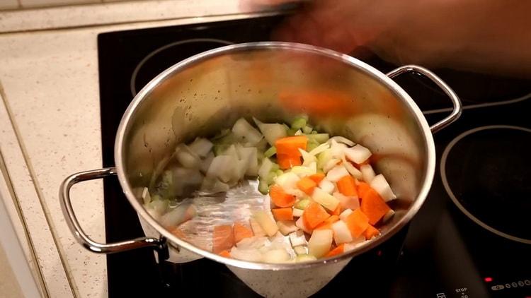 To cook pollock soup, cook vegetables