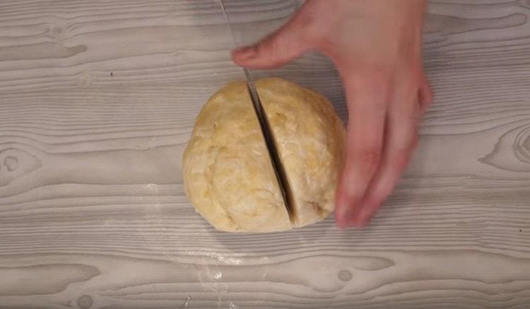 Divide the dough in half.