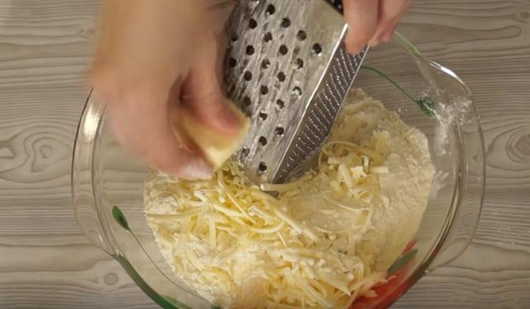 We rub cold butter directly into the flour on a grater.