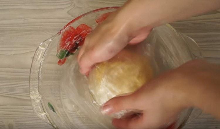 Wrap the dough in cling film and put in the refrigerator.