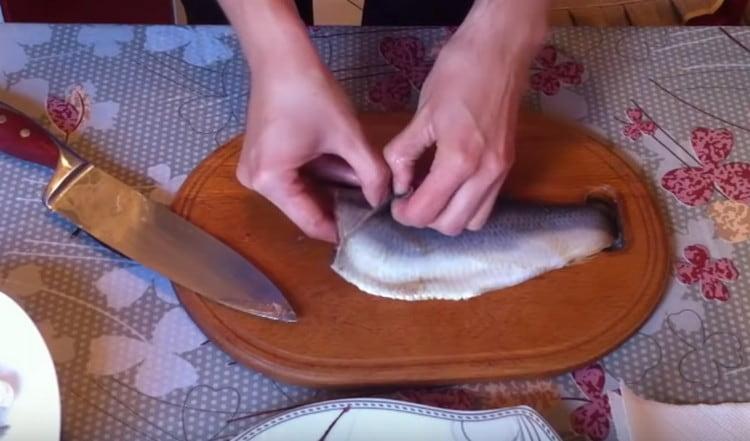 Carefully remove the film on top of the fillet.